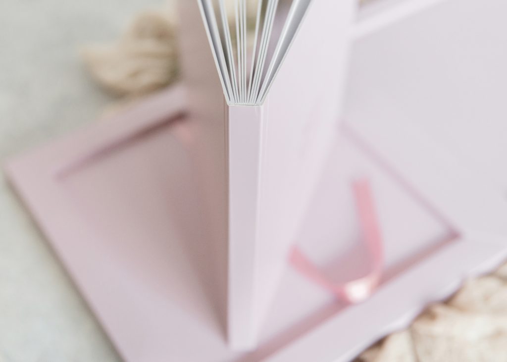 pale pink baby book with lay flat pages