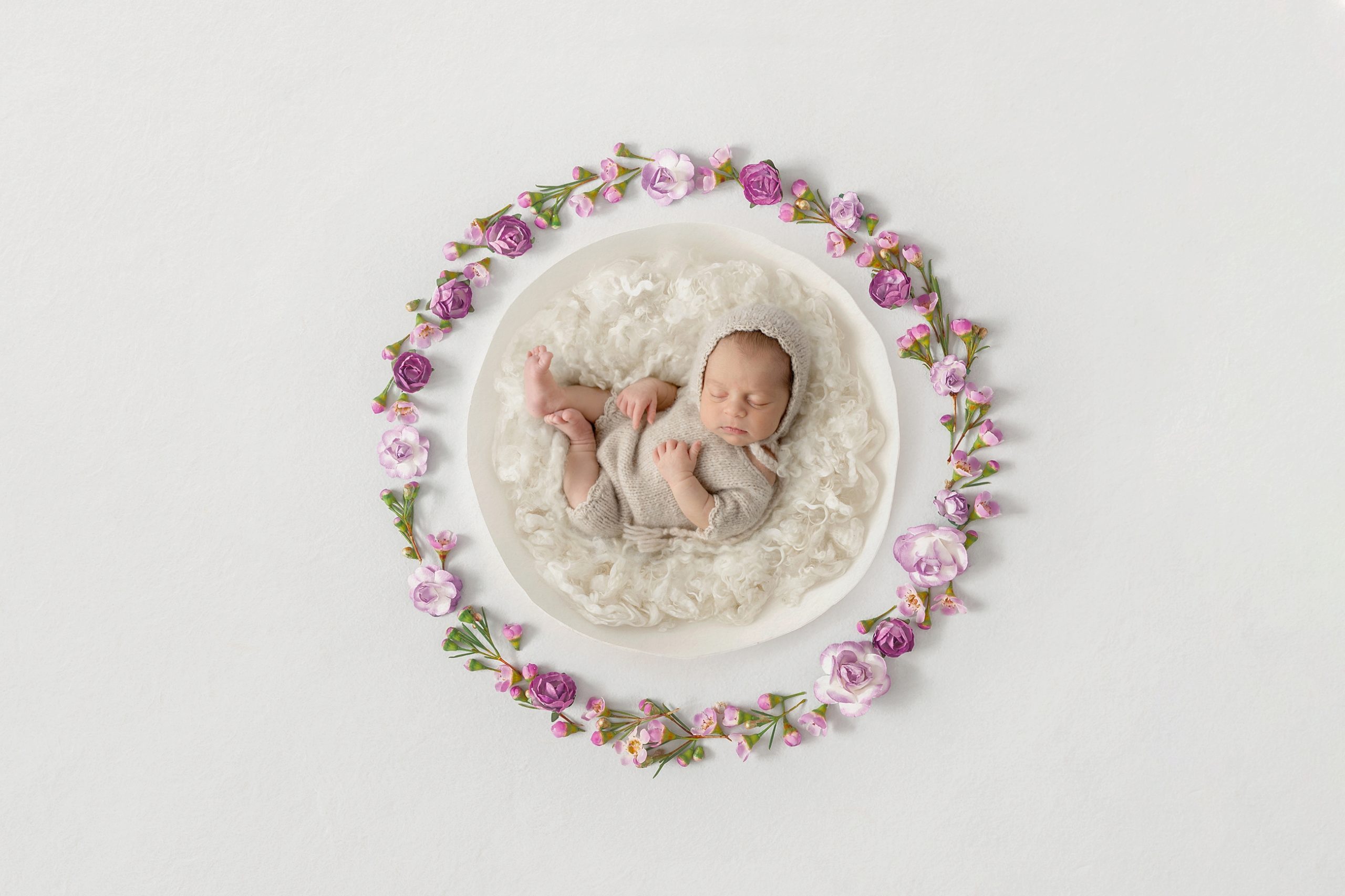 circular newborn portrait with florals